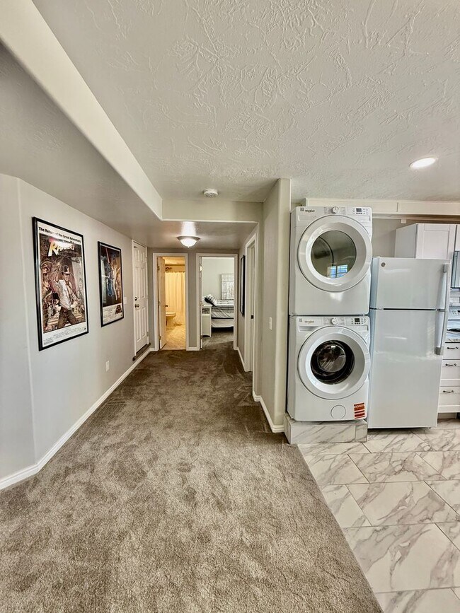 Building Photo - Furnished and Utilities Included: Two-Bedroom Basement Apartment with Private Yard