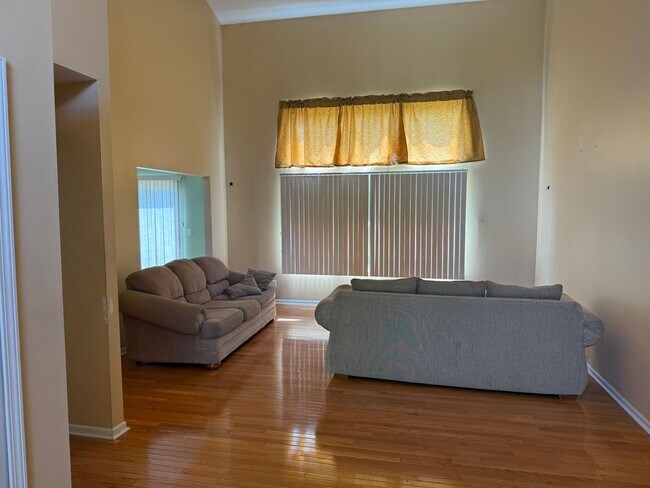 Building Photo - Large 2 Story home with 3 Bedrooms, 2.5 baths, hardwood floors, office and finished basement