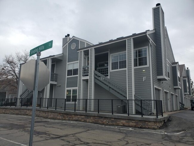 Building Photo - 7477 Singing Hills Dr