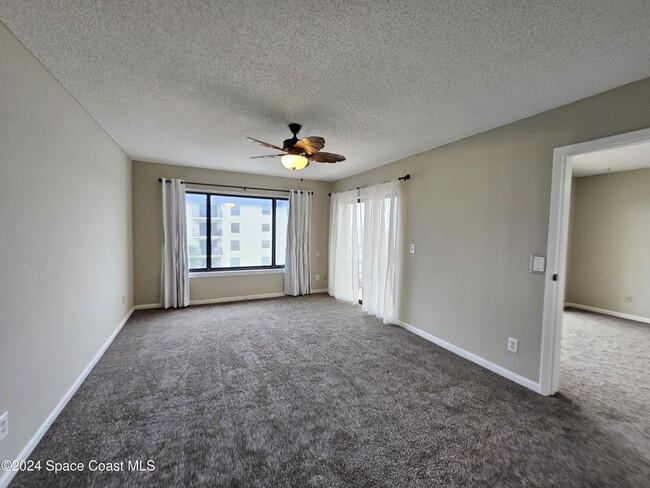 Building Photo - Coastal Paradise Awaits: Elegant 2-Bed, 2-...