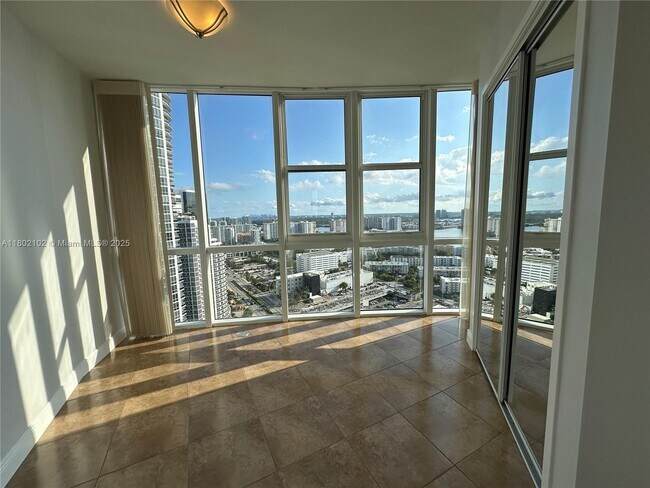 Building Photo - 18201 Collins Ave