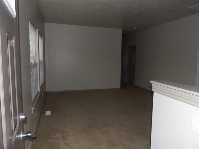 Building Photo - Spacious 3 Bedroom, 2 Bathroom Duplex with Two Car Garage and Fenced Yard!