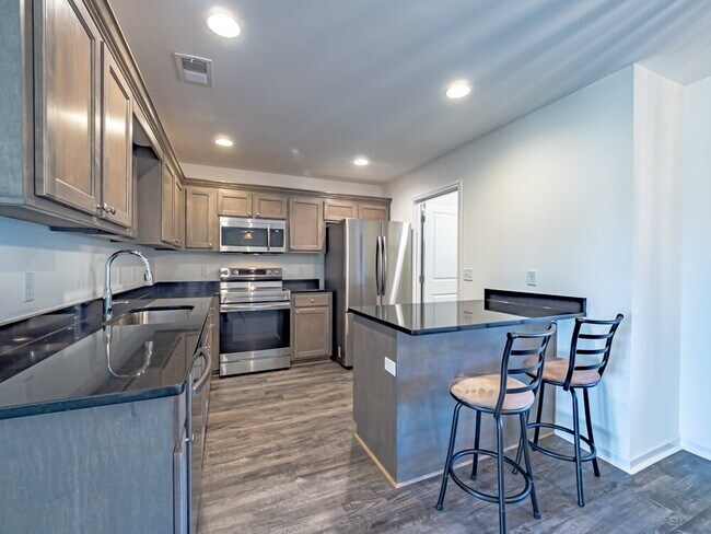 Building Photo - Available now! Has solar panels!