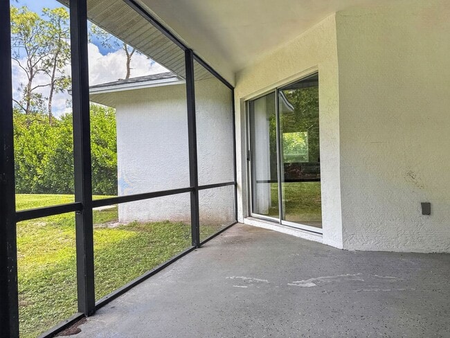 Building Photo - Annual rental offering privacy and space on 1.14 acres in Naples!