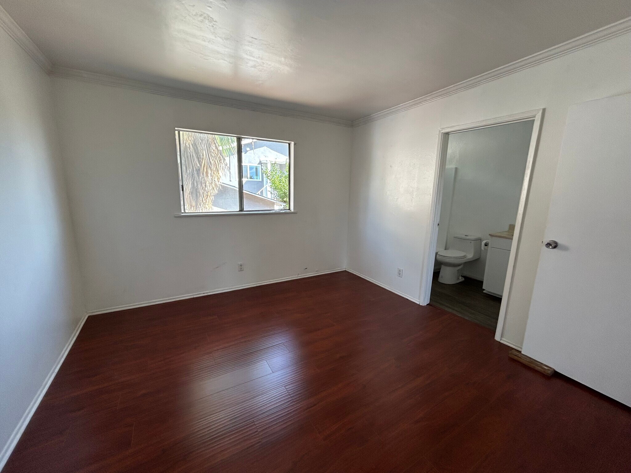 3rd bedroom with small door closet and restroom - 1156 N Chicago St