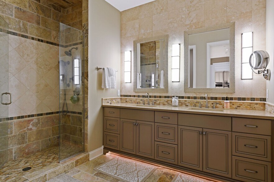 Primary bath with double vanities and large walk in shower - 875 Lake St N
