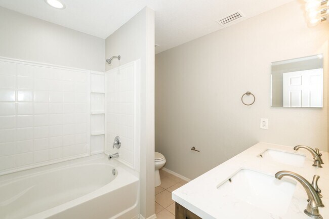 Building Photo - 3 BR/2.5BA | Newly Renovated Single Family Home | 2-Car Garage | Fenced backyard | In Ashley Pines!