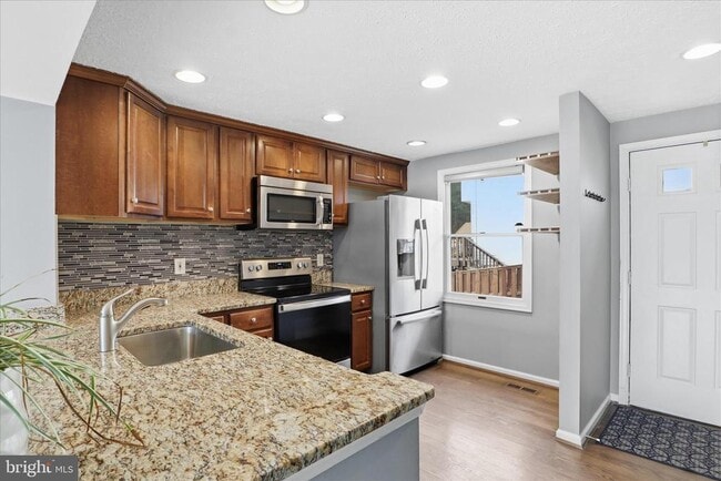 Building Photo - 8418 White Feather Ct