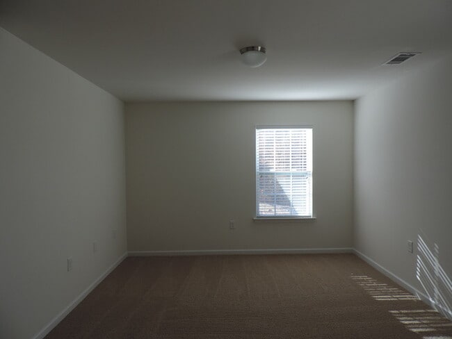 Building Photo - New, 4 bedroom home in the Hallstead commu...