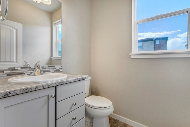 Building Photo - Modern 4BR with Open Kitchen, Patio & 2-Car Garage