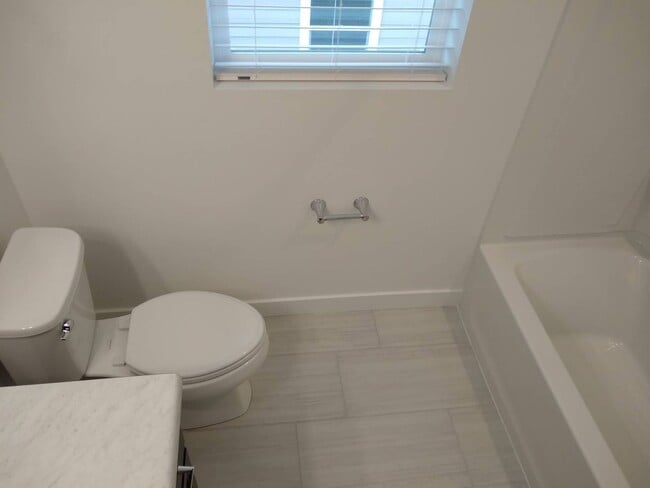 Building Photo - Pet Friendly Gorgeous Row End Townhome w 2 car attached garage!