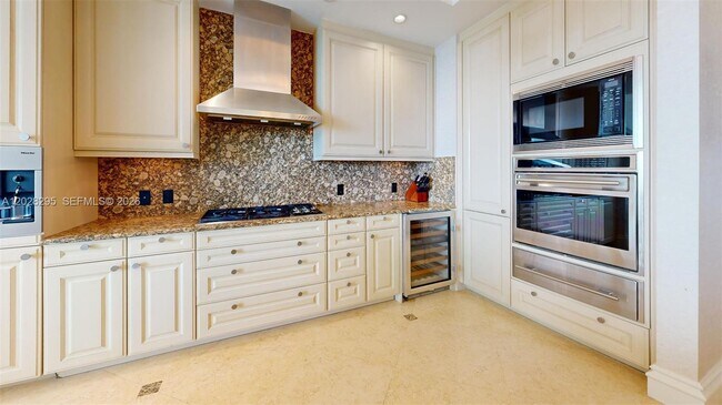 Building Photo - 10295 Collins Ave
