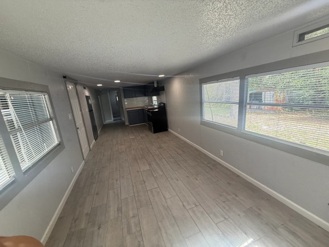 Building Photo - All utilities included. 2 Bedrooms. Lawn care included