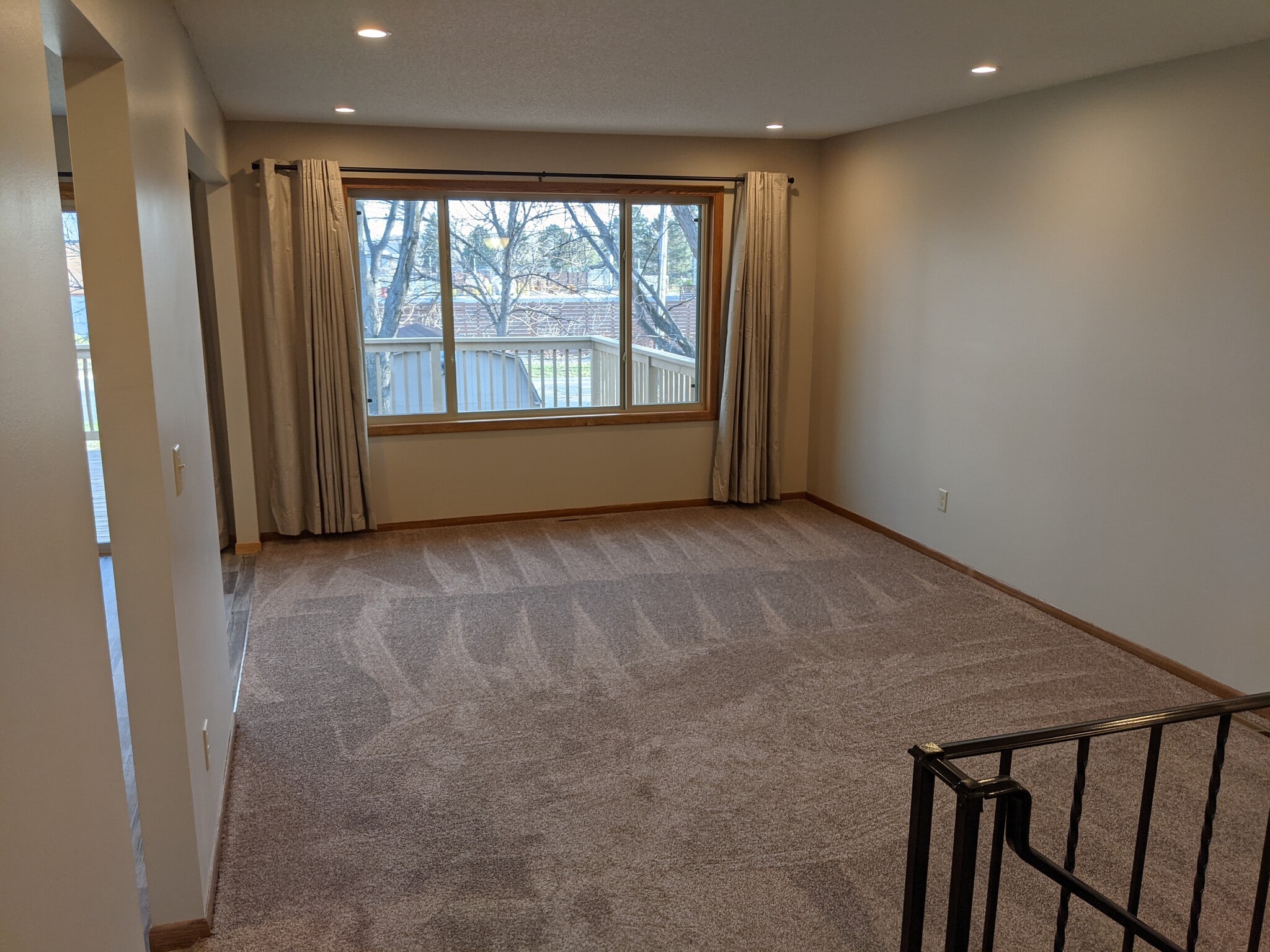 Upper level living room - 7644 Woodlawn Dr