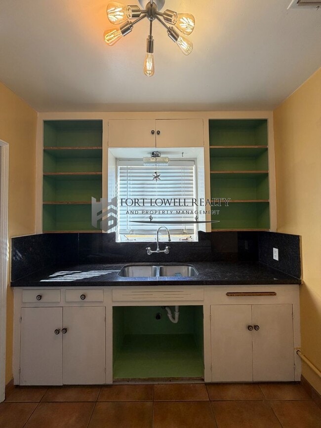 Building Photo - Welcome to this charming 2-bedroom, 1-bathroom + Den!