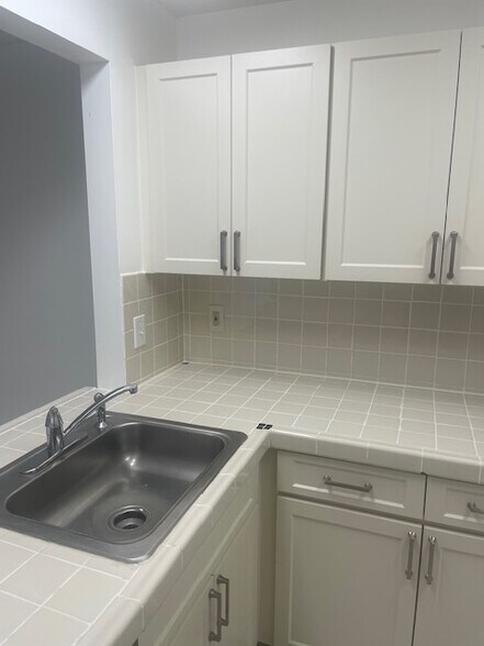Renovated kitchen counter and new cabinets - 14851 SW 104th St