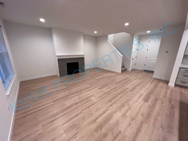 Building Photo - FREE RENT! Spacious 4-Bedroom Home in Happ...