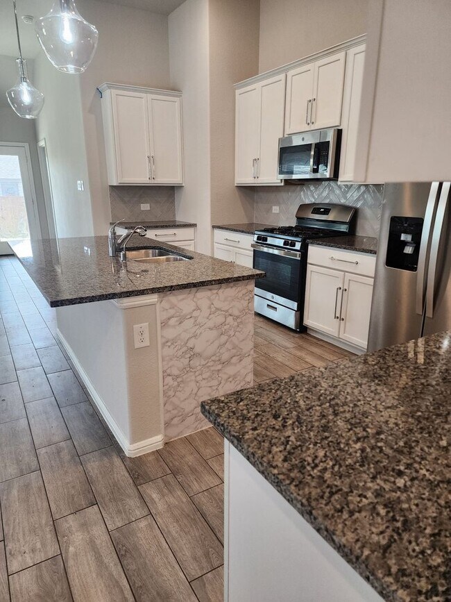 Building Photo - Stunning 4-Bedroom Home in Crowley