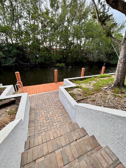 Steps to Dock and Canal - 1400 NE 57th St