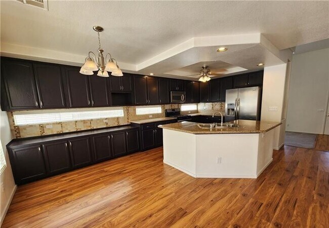 Building Photo - Beautiful two story home with a two car garage, covered RV gate, and dedicated RV parking.