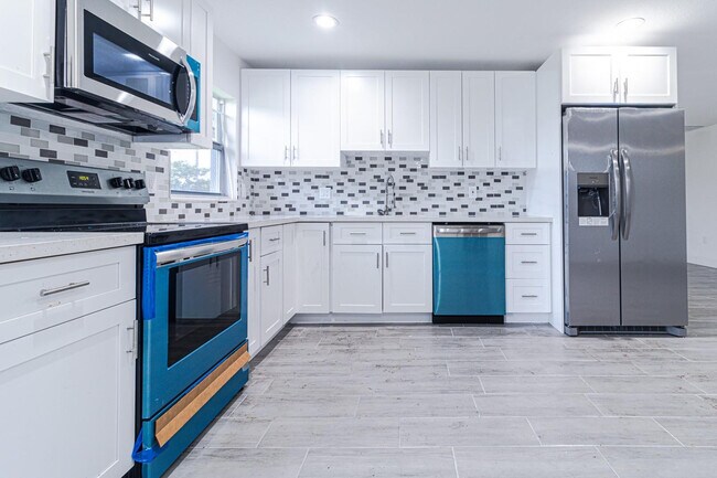 Building Photo - 163 W Blue Heron Blvd