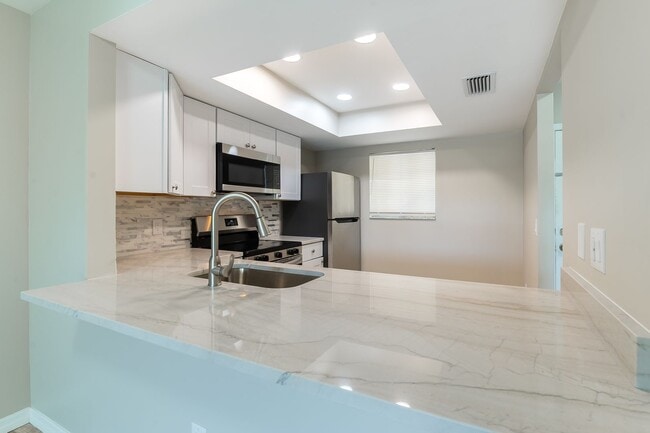 Building Photo - Newly Renovated, 2-Bed, 2-Bath, 2nd Floor Unfurnished Condo in Great Location