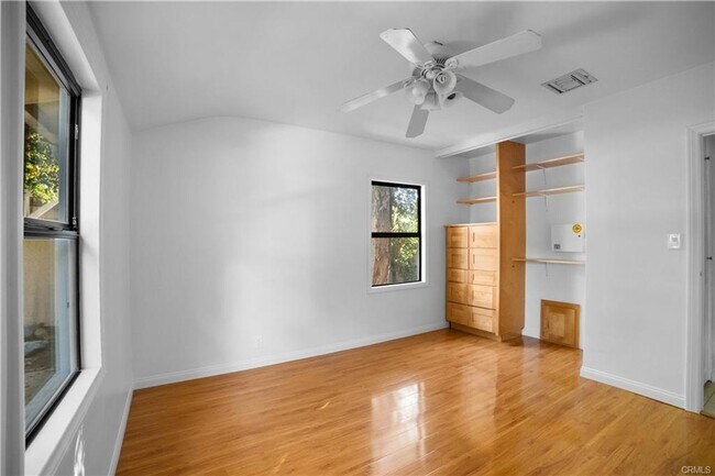 Building Photo - Tucked away behind gorgeous grand gates is this beautifully updated 3 bedroom 2 bath home