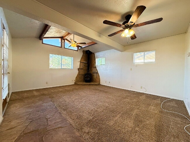 Building Photo - "Charming 3-Bedroom Oasis in Goodyear - Sp...