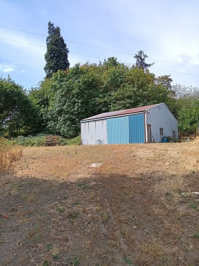 Building Photo - Beautiful Secluded Farmhouse & Shop is Available!