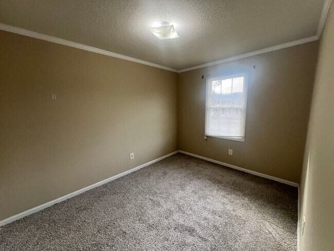 Building Photo - Introducing a charming 4-bedroom, 2-bathroom house in the desirable Gastonia, NC area