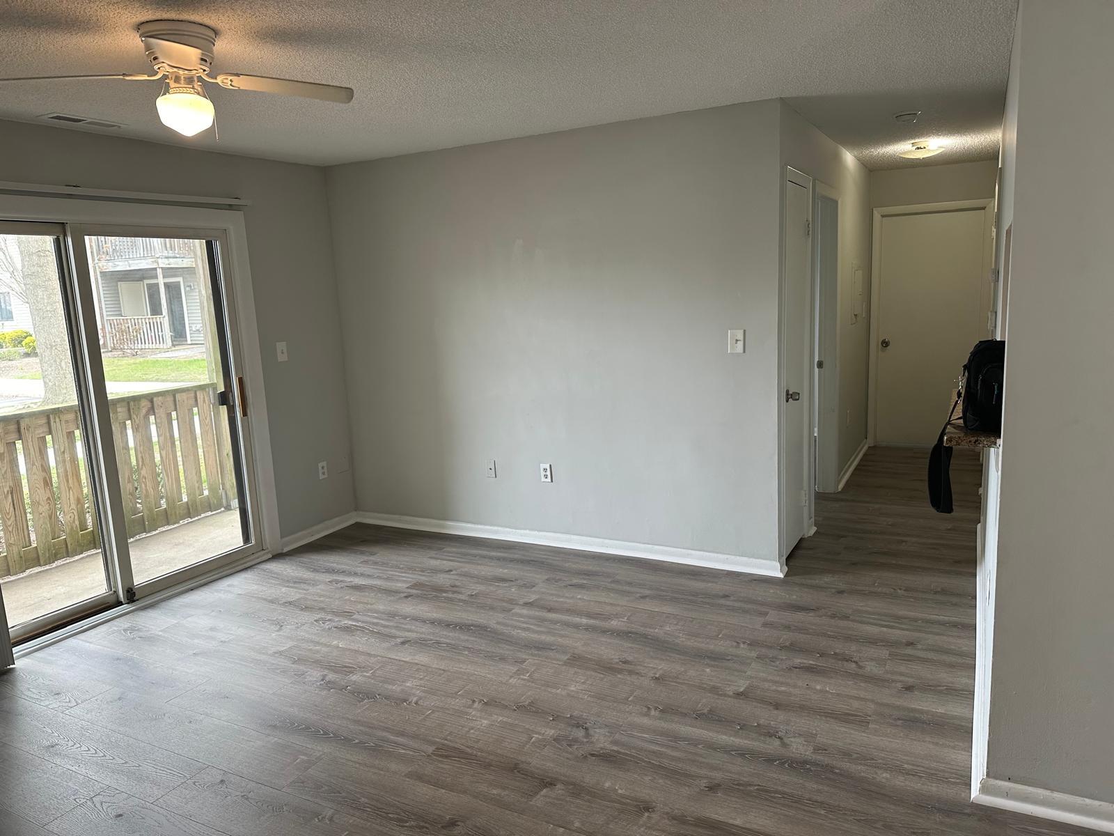 Living room w/ walk out patio - 505 Ravens Crest Dr