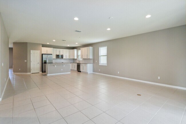 Building Photo - Gorgeous Energy Efficient 4/2 Home in Gated Community Close to Lake Nona