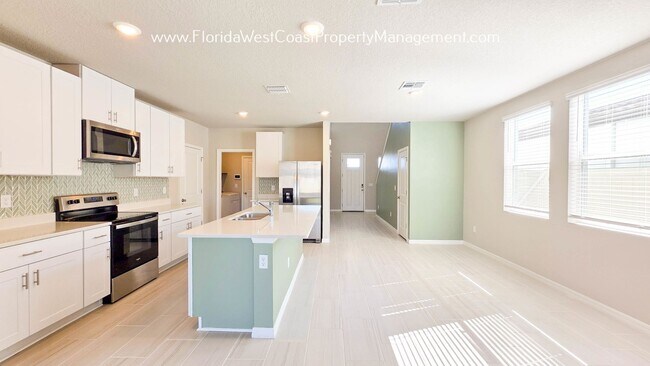 Building Photo - BRILLIANT and SPACIOUS! 4 BEDROOM/2.5 BATH PLUS LARGE BONUS-FLEX SPACE and FENCED YARD!