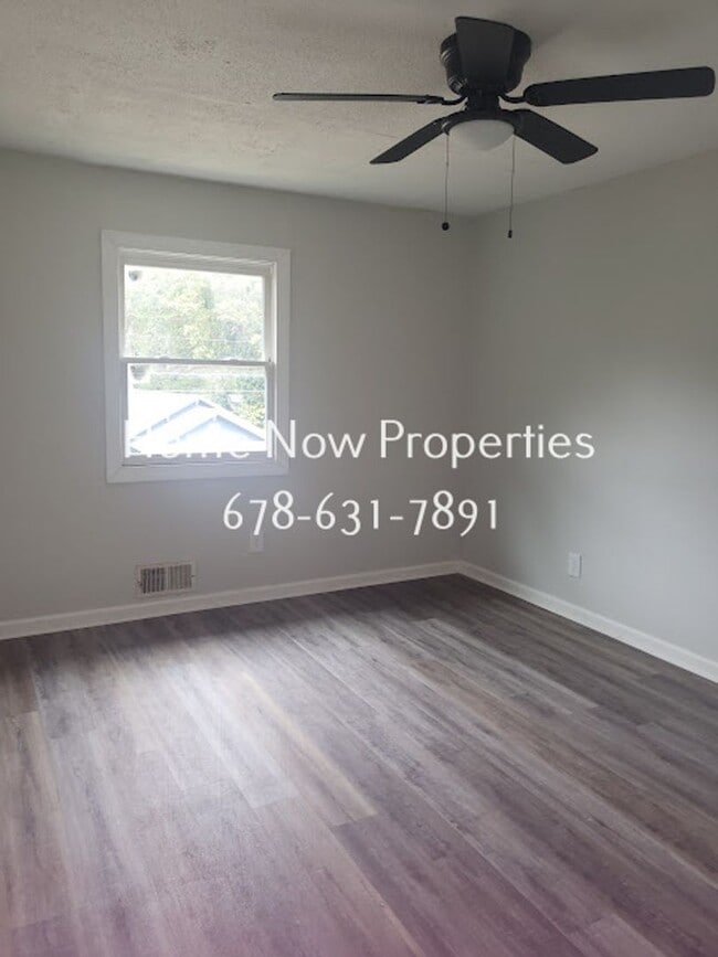 Building Photo - Modern Townhome w/ Granite Kitchen + Fenced Yard – Move-In Ready