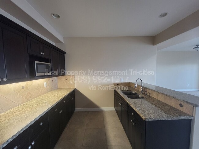 Building Photo - 2348 W 49th Ave