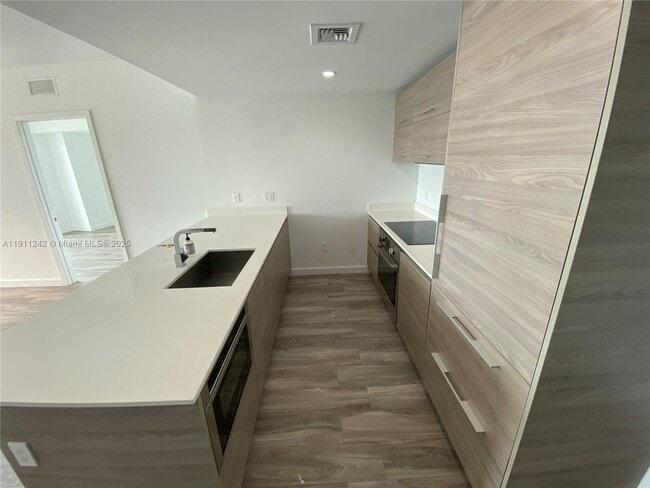 Building Photo - 1300 S Miami Ave