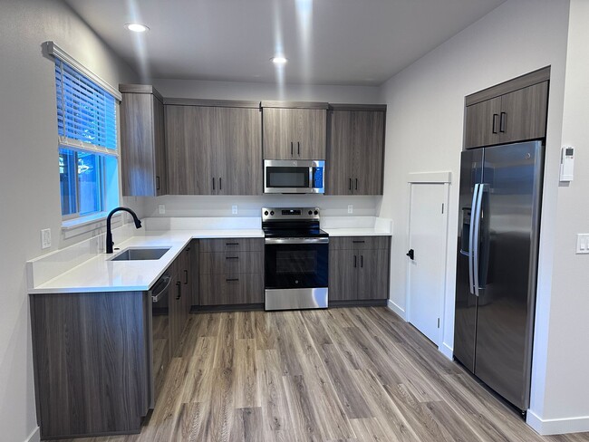 Building Photo - NEW 3 Bedroom near Vince Genna Stadium - Available 4/8