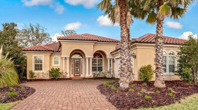 Building Photo - Must See, 4/3, Walking Distance to the Beach!
