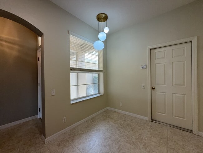 Building Photo - 9818 Fan Palm Way