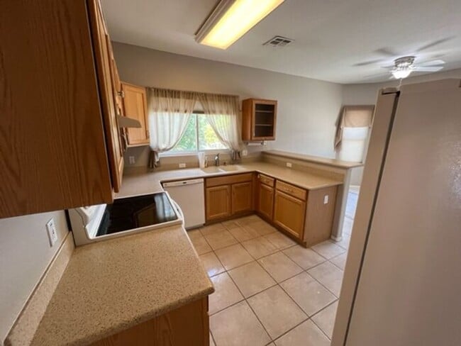 Building Photo - Bright 3BR NW Tucson Basecamp | Private Yard + 2-Car Garage