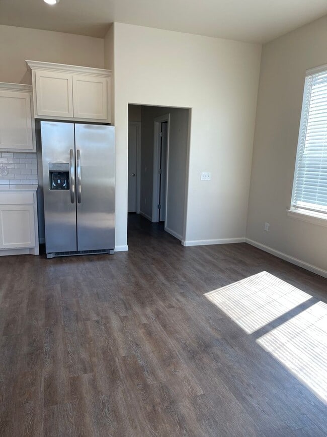 Building Photo - *Fully Furnished* 4 bedroom, 2.5 bathroom, 2 car garage Gated Neighborhood