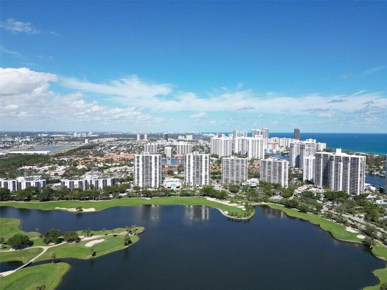 Building Photo - 3675 N Country Club Dr