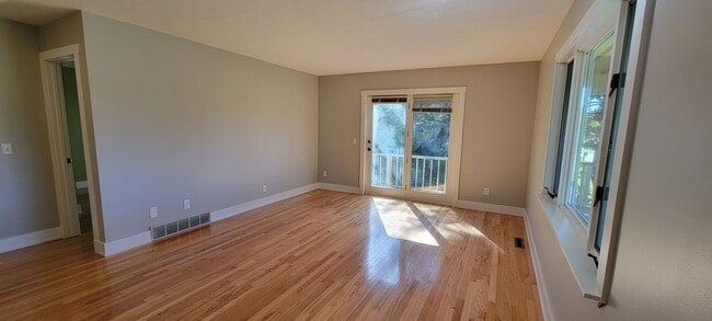 Building Photo - Beautiful home with peek a boo views of West Bay on Old Mission Peninsula