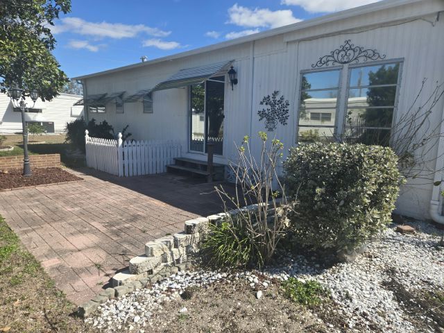 Building Photo - 303 50th Avenue Plaza W