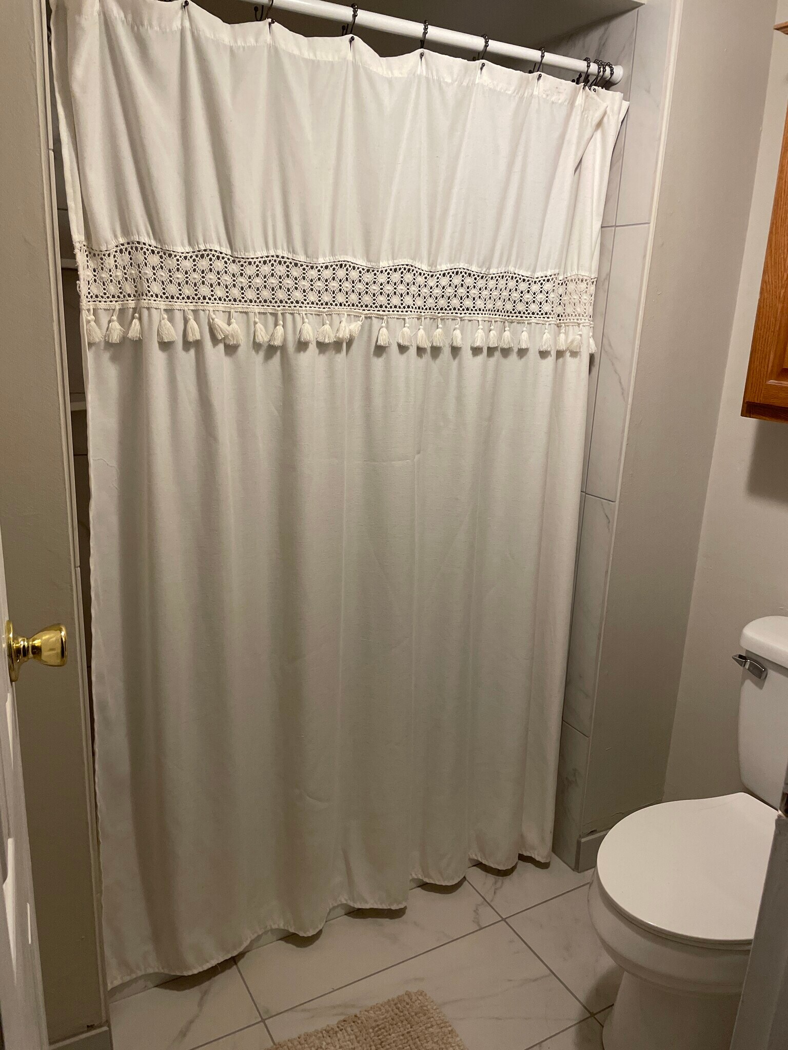 Master bath shower with curtain closed - 127 Leedom Way