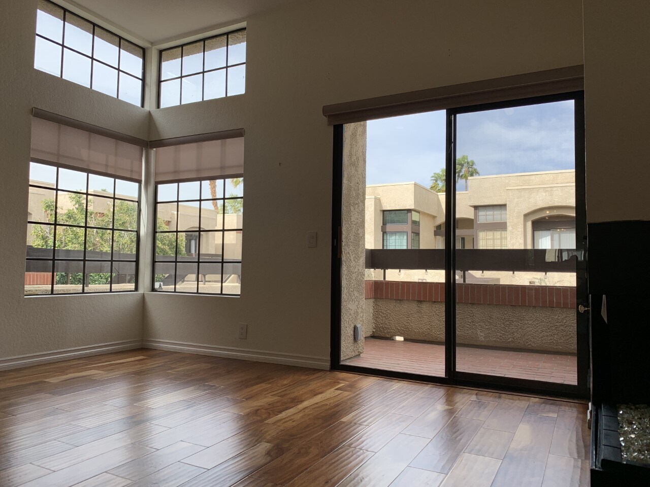 living room, balcony, fireplace facing north - 2601 S Broadmoor Dr