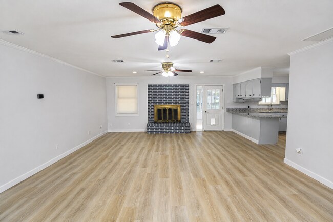 Building Photo - Spacious 4BR, 2BA Central Pensacola Home on a Large Corner Lot with Sunroom & 2-Car Garage