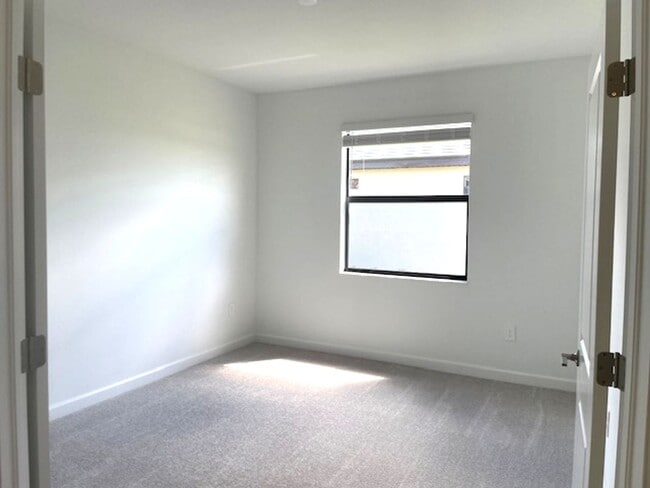Building Photo - New Construction 2 Bedroom PLUS a Home Office Available in Lorraine Lakes