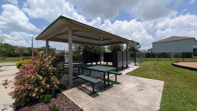 Building Photo - MOVE IN READY ! 4 BEDROOM/2 BATH! TILE- LVP THROUGHOUT! LAWN MOWING INCLUDED!
