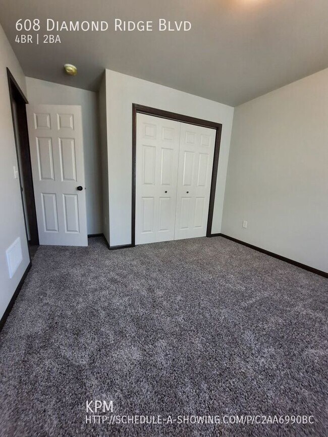 4 BED 2 BATH DOUBLE GARAGE RAPID VALLEY 608 Diamond Ridge Blvd
